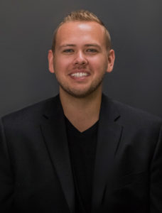 Dylan Holly headshot jacket web